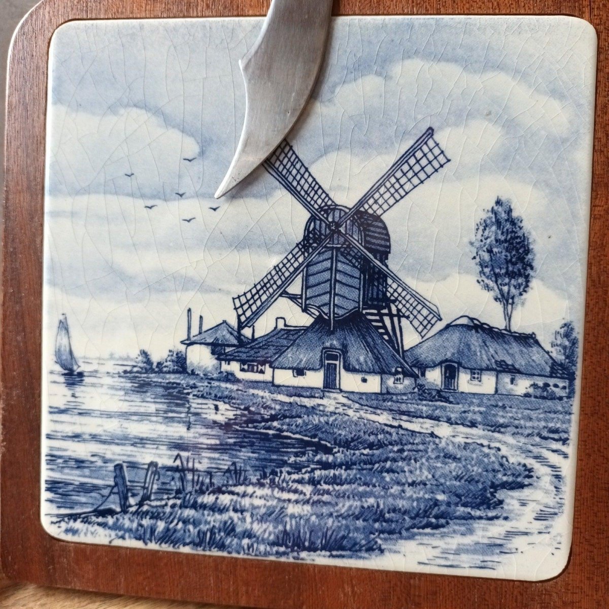Vintage Hollandse onderzetter met mes - Veilingcoach.be